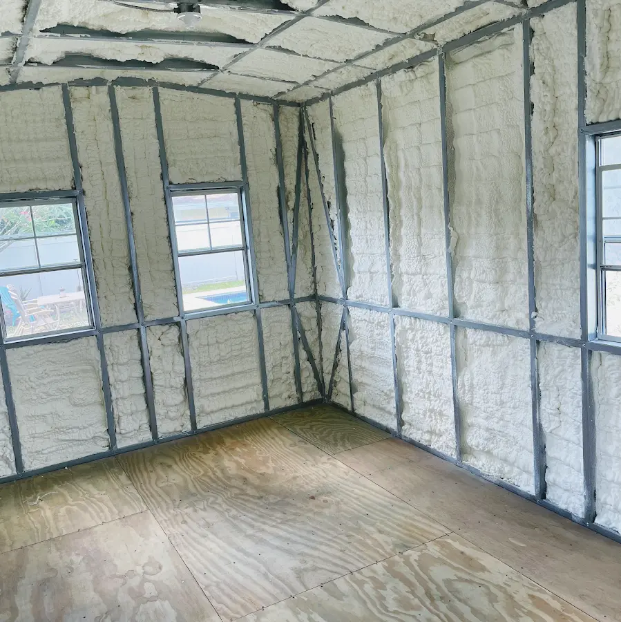 Closed-cell spray foam insulation applied to wall cavities in a residential project in Manassas Park